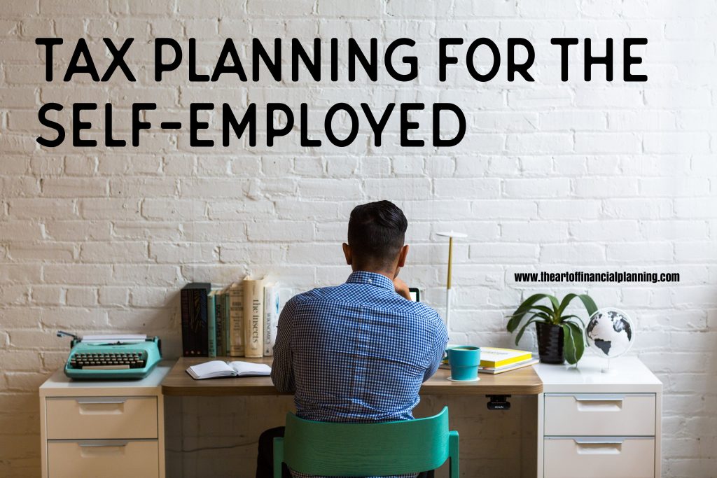 tax planning for the self-employed. millennial man at modern desk